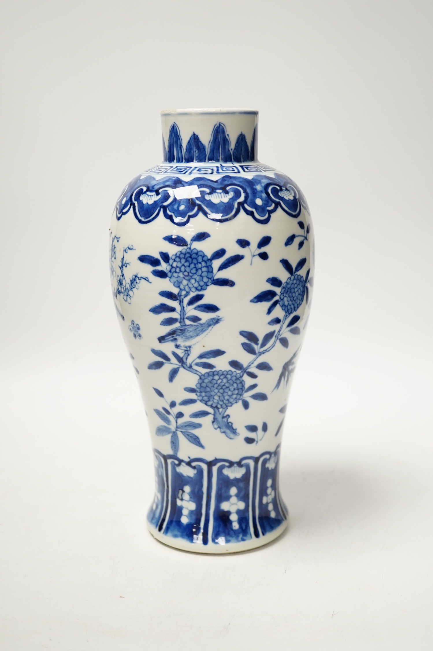 A Chinese blue and white baluster vase decorated with birds and flowers, late 19th century, 27cm high